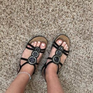 Clark’s artisan black leather sandals